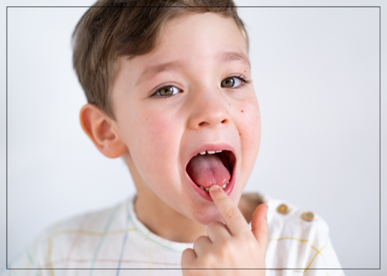 Child wiggling loose tooth